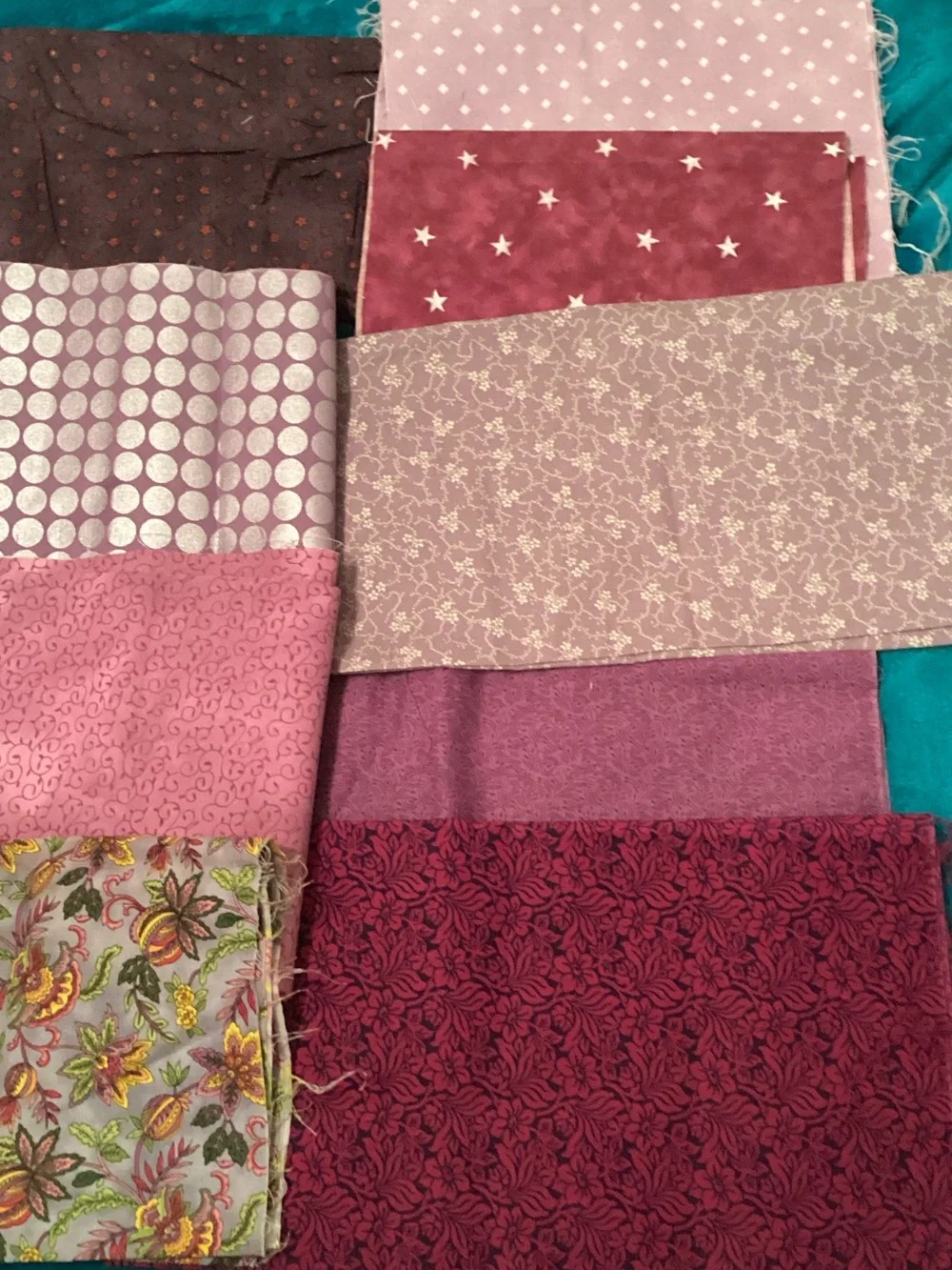 Assorted purple fabrics